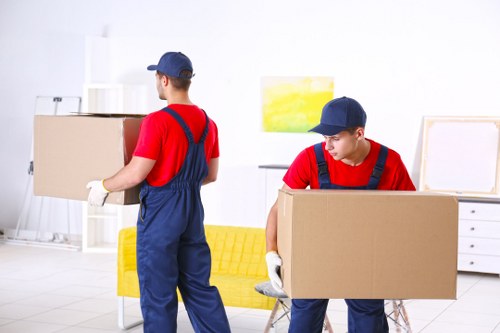 Boxes and furniture being loaded for Friern Barnet storage pricing