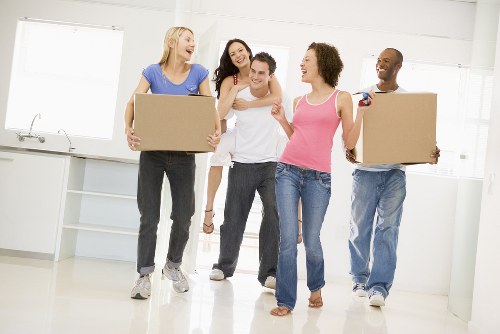Packed moving boxes and furniture stored safely in Friernbarnet