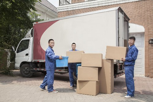 Ethical storage staff reviewing modern slavery compliance documents